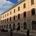 Il pi antico istituto della citt: la scuola media  San Nicola, nata nel 1896 come Regia Scuola dArti e Mestieri Umberto I. Costruita al posto dello scomparso Ospizio dei Pellegrini, si trova in largo Urbano II, lo stradone che affianca la Basilica. Si presenta austero, privo di elementi classicheggianti e si sviluppa su tre livelli, con una fascia inferiore in bugnato rustico e la parte superiore intonacata in giallo pallido